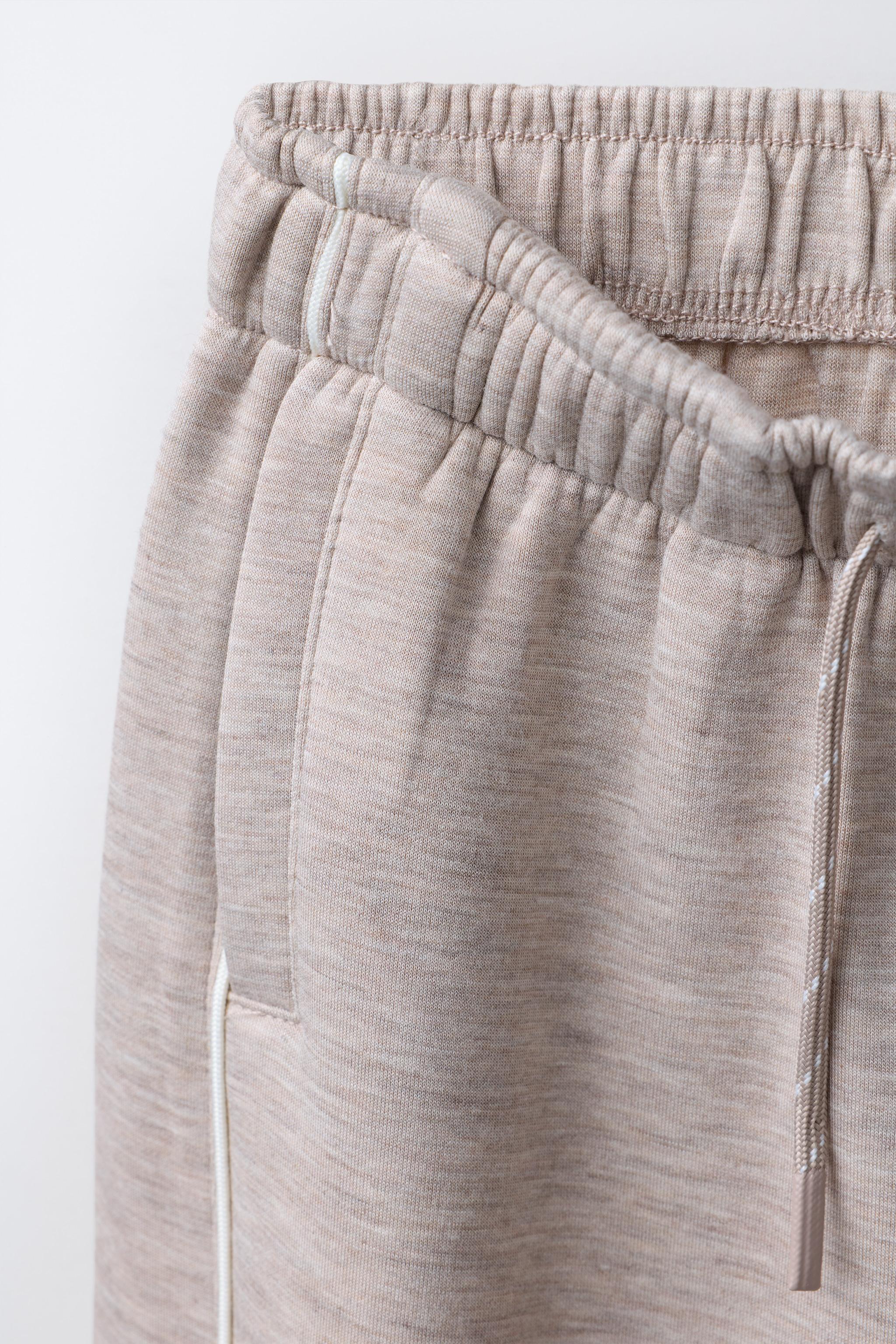 WIDE LEG GYM PANTS WITH CONTRAST PIPING